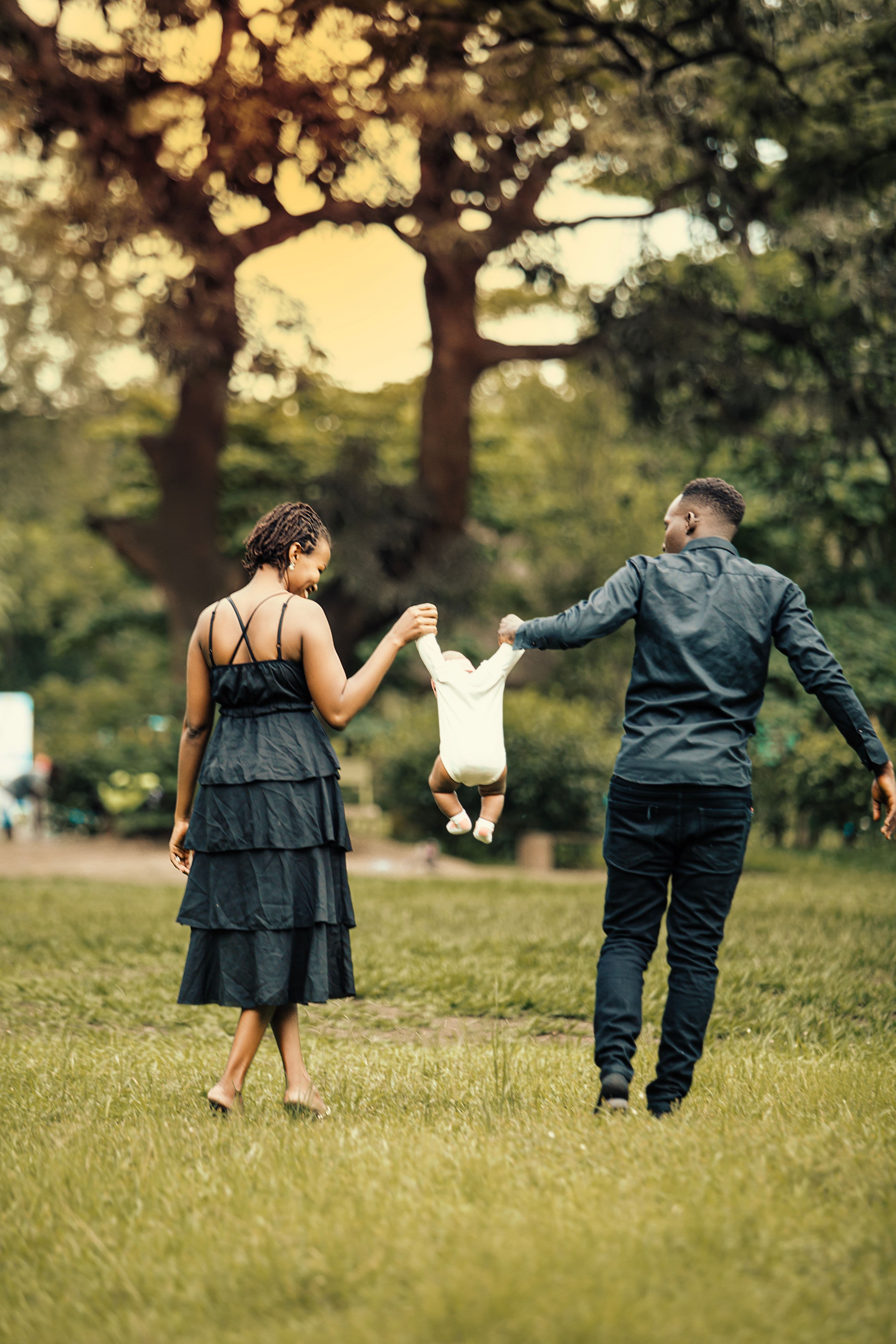 A joyful family playing together outdoors
